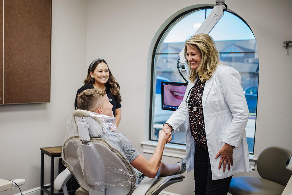 Katy Smile Design | Implant Restorations, Invisalign reg and Fluoride Treatment